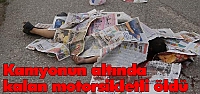 Kamyonun altında kalan motorsikletli öldü